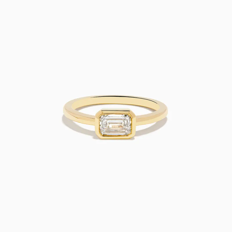 The East West Emerald Bezel Ring sold by Promise By Effy