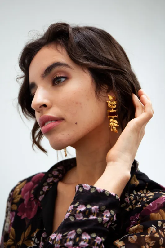 Gold Leaf and Garnet Earrings sold by Raishma