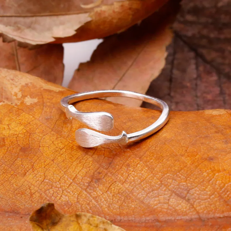 To My Granddaughter "Be like a fish, swimming against the current." Fish Ring sold by SARAH'S WHISPER