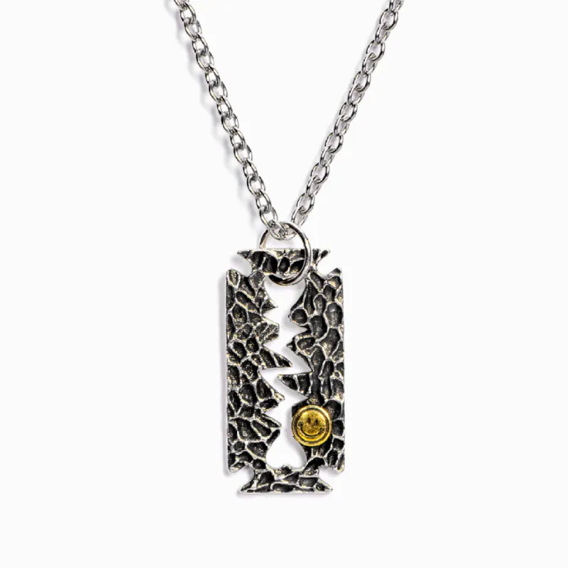 "If you know how to shave the razor, you will know how to erase the eraser." Razor-Blade Necklace sold by SARAH'S WHISPER