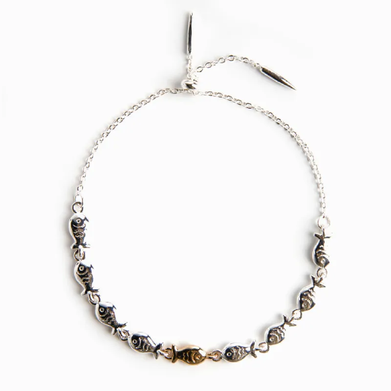 To My Granddaughter "BE STRONG SWIMMING AGAINST THE CURRENT" Fish Bracelet sold by SARAH'S WHISPER