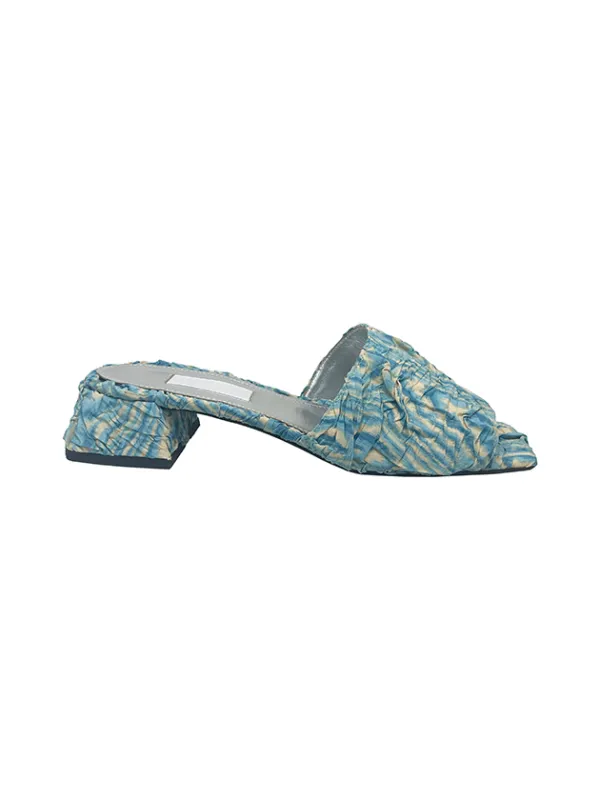 plissé slide sold by Suzanne Rae