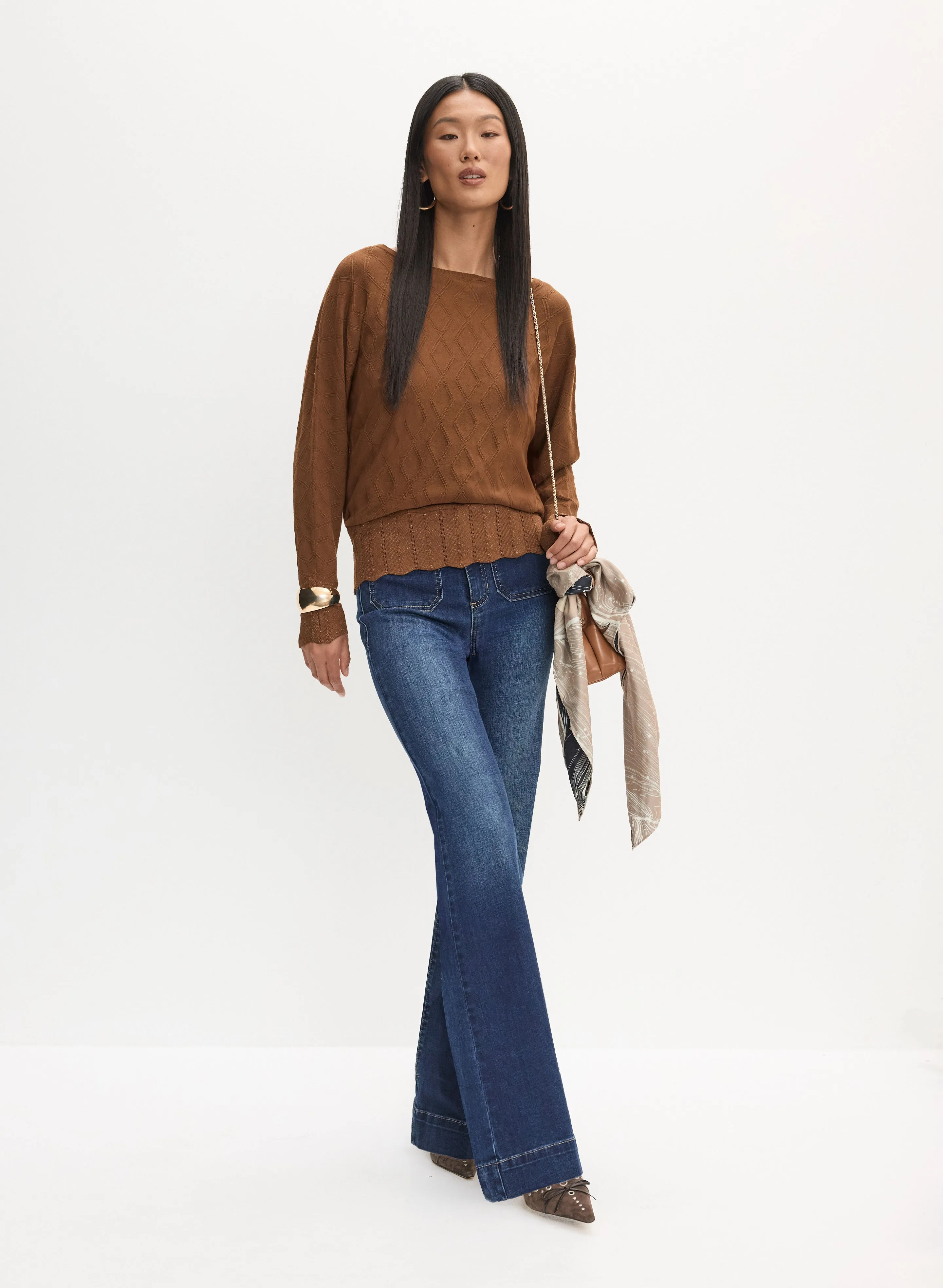 Geometric Stitch Sweater & Flare Leg Jeans sold by Melanie Lyne