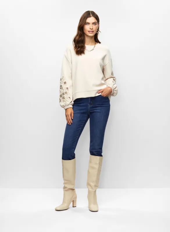 Crew Neck Sweater & Emboidered Jeans sold by Melanie Lyne