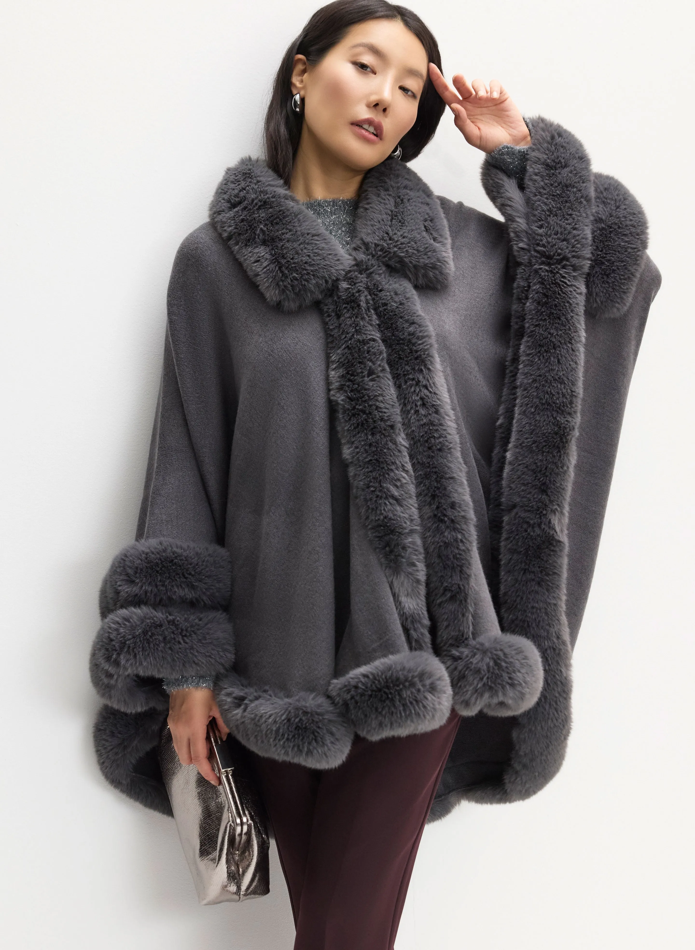 Faux Fur Poncho sold by Melanie Lyne
