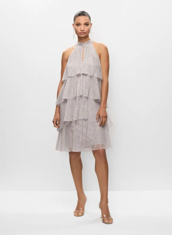Tiered Dress & Sequin Clutch sold by Melanie Lyne