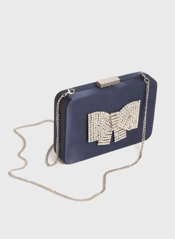 Crystal Bow Detail Clutch sold by Melanie Lyne