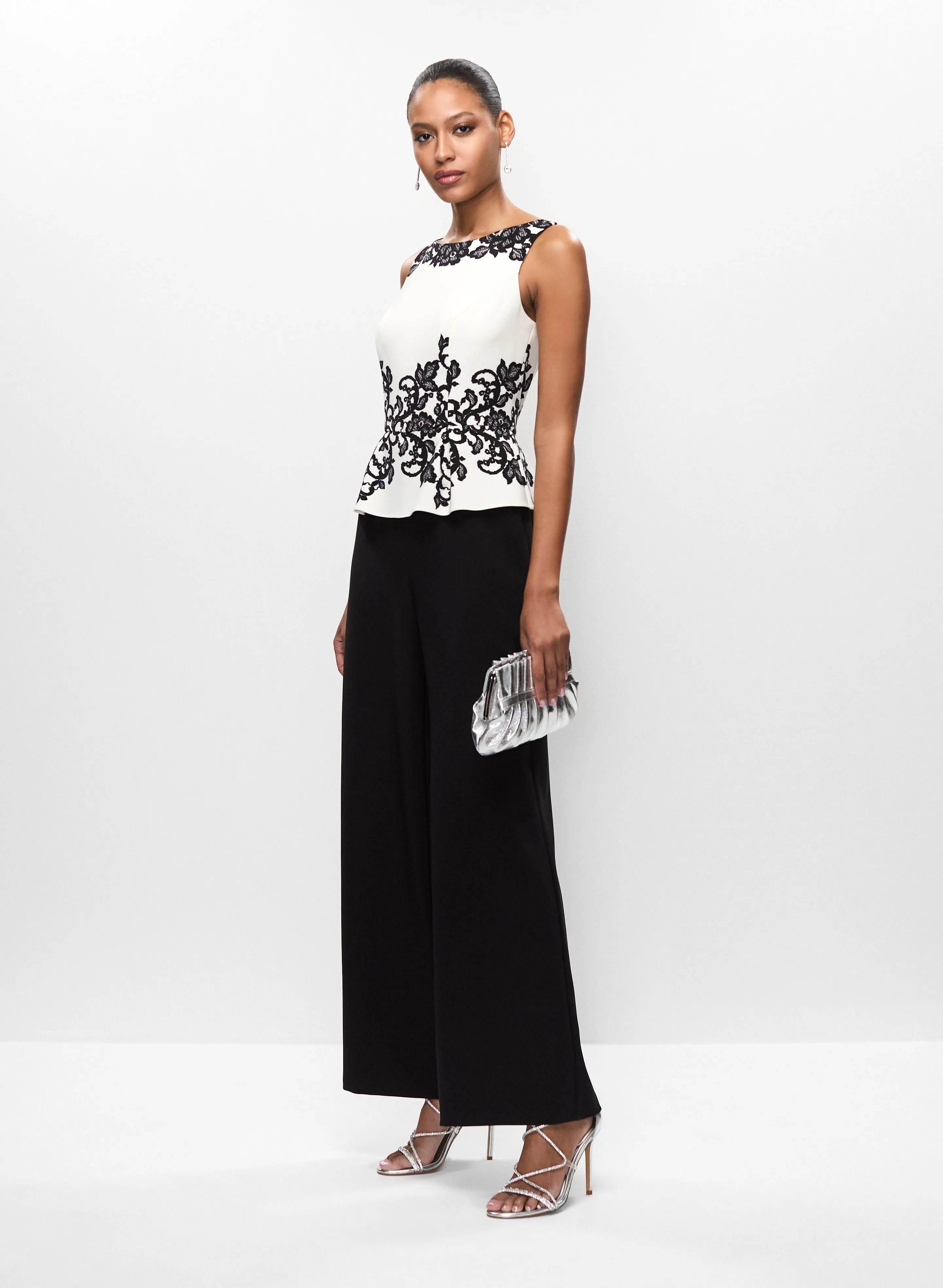 Peplum Style Jumpsuit & Linear Earrings sold by Melanie Lyne