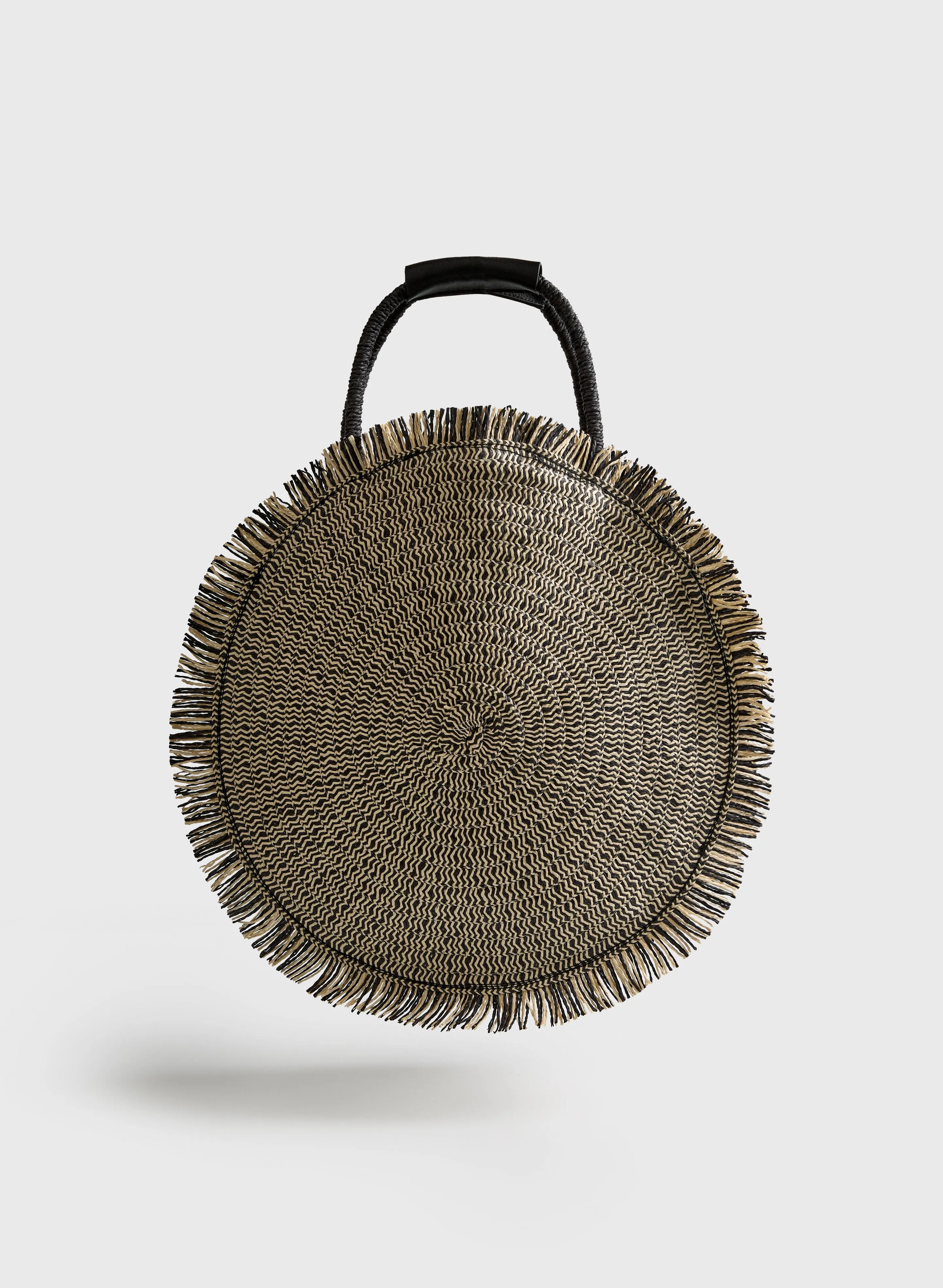 Fringed Round Straw Bag sold by Melanie Lyne