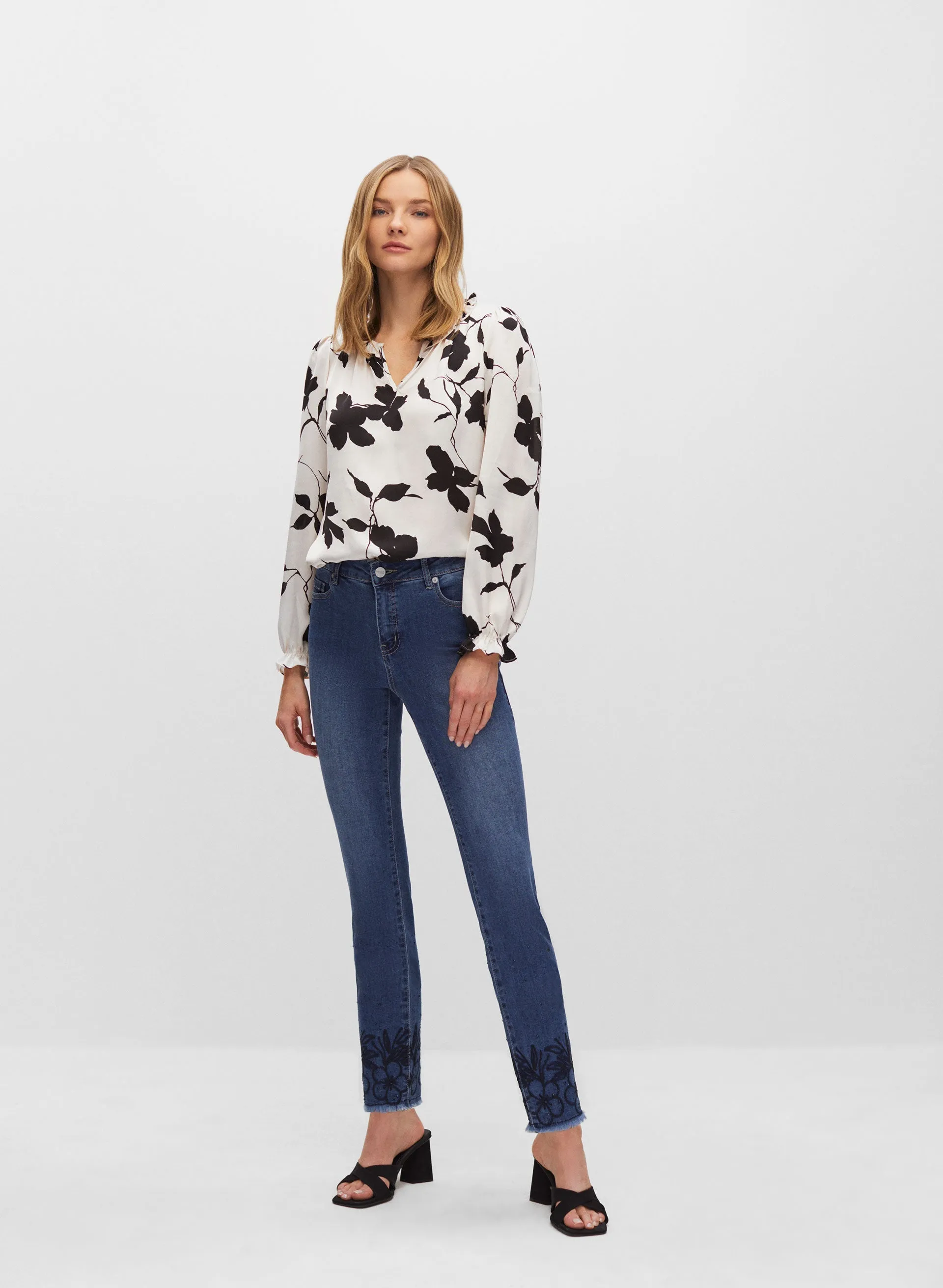 Embroidered Hem Slim Leg Jeans sold by Melanie Lyne