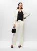 Cropped Jacket & Flared Pants sold by Melanie Lyne