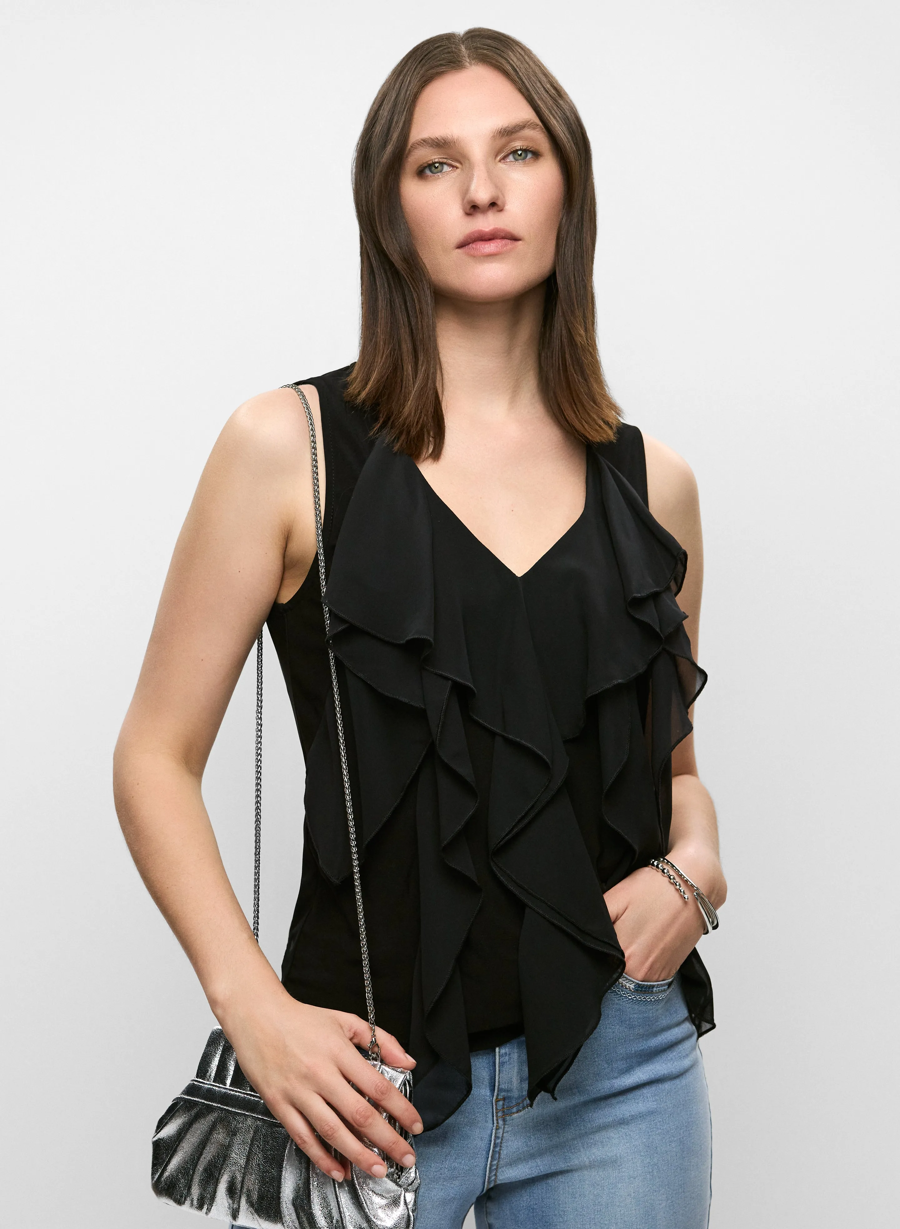 Sleeveless Cascading Ruffle Top sold by Melanie Lyne