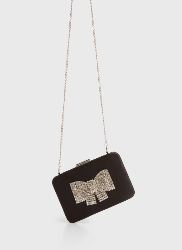 Crystal Bow Detail Clutch sold by Melanie Lyne