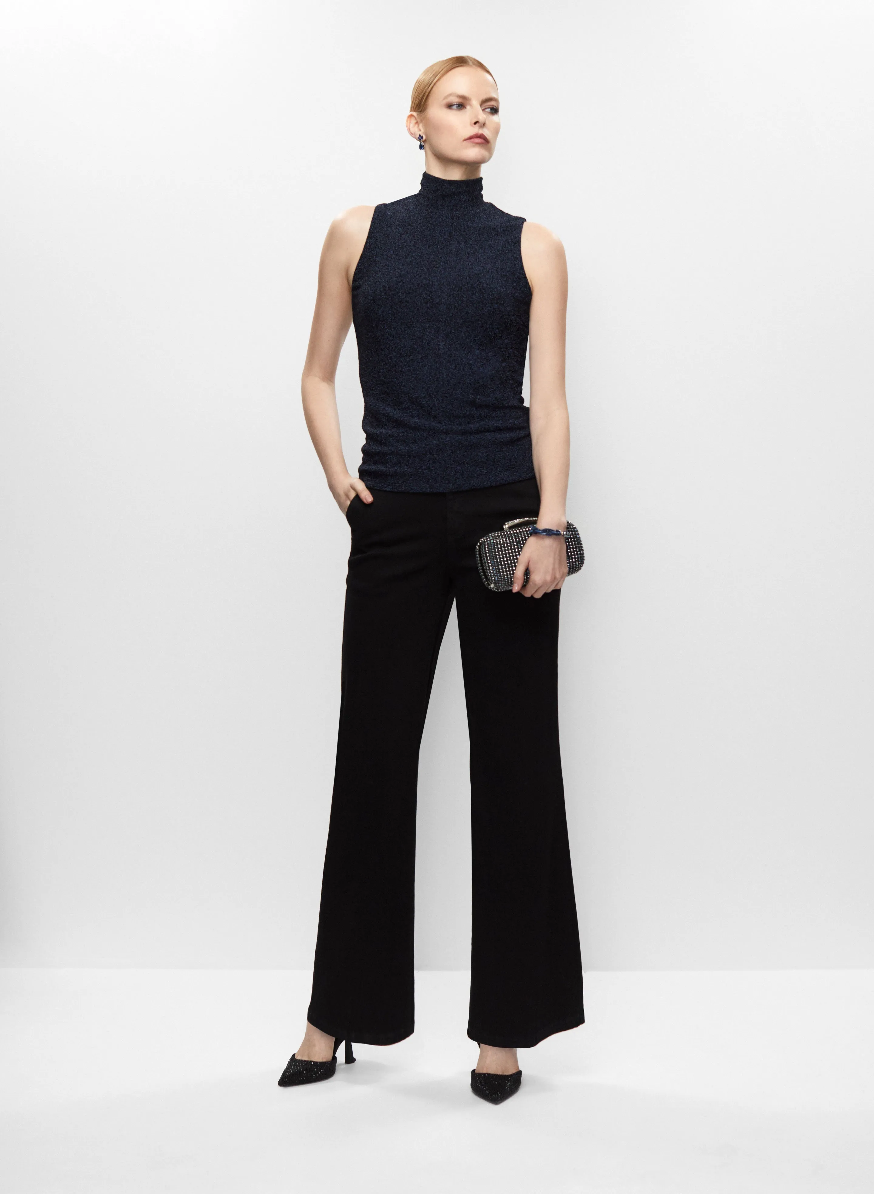 Glitter Top & Flare Leg Jeans sold by Melanie Lyne