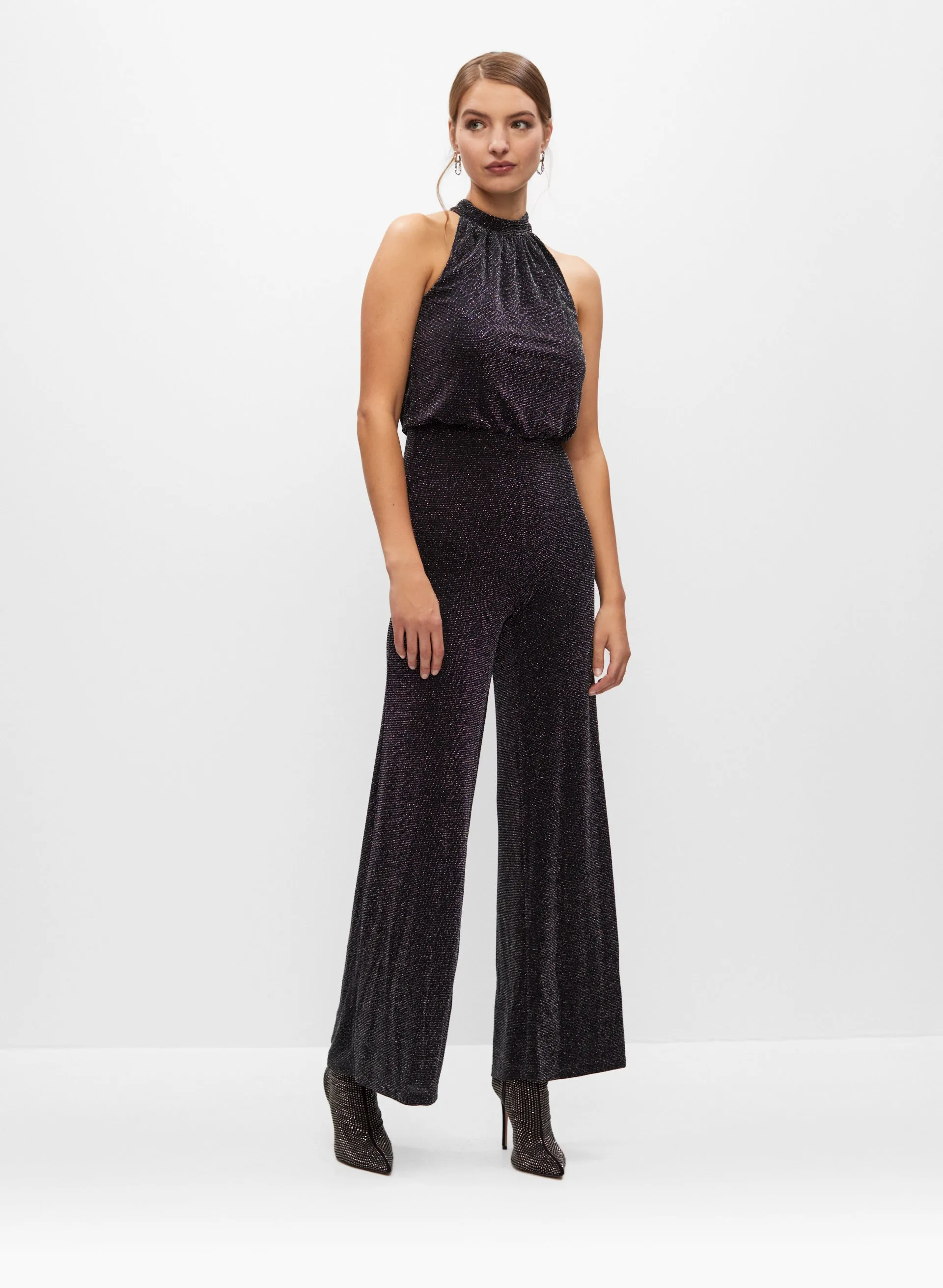 Glitter Jumpsuit sold by Melanie Lyne