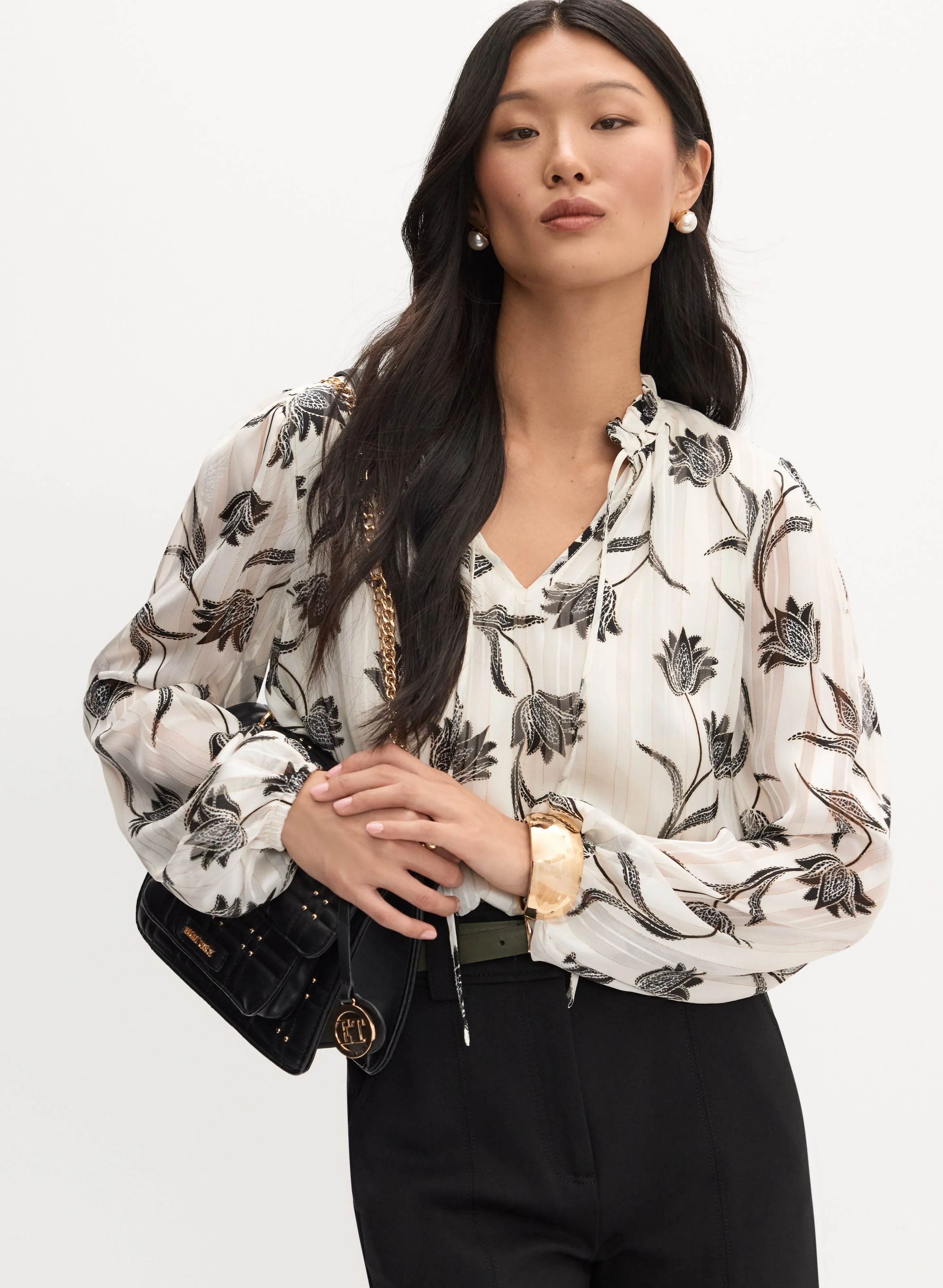 Floral Smocked Hem Blouse sold by Melanie Lyne