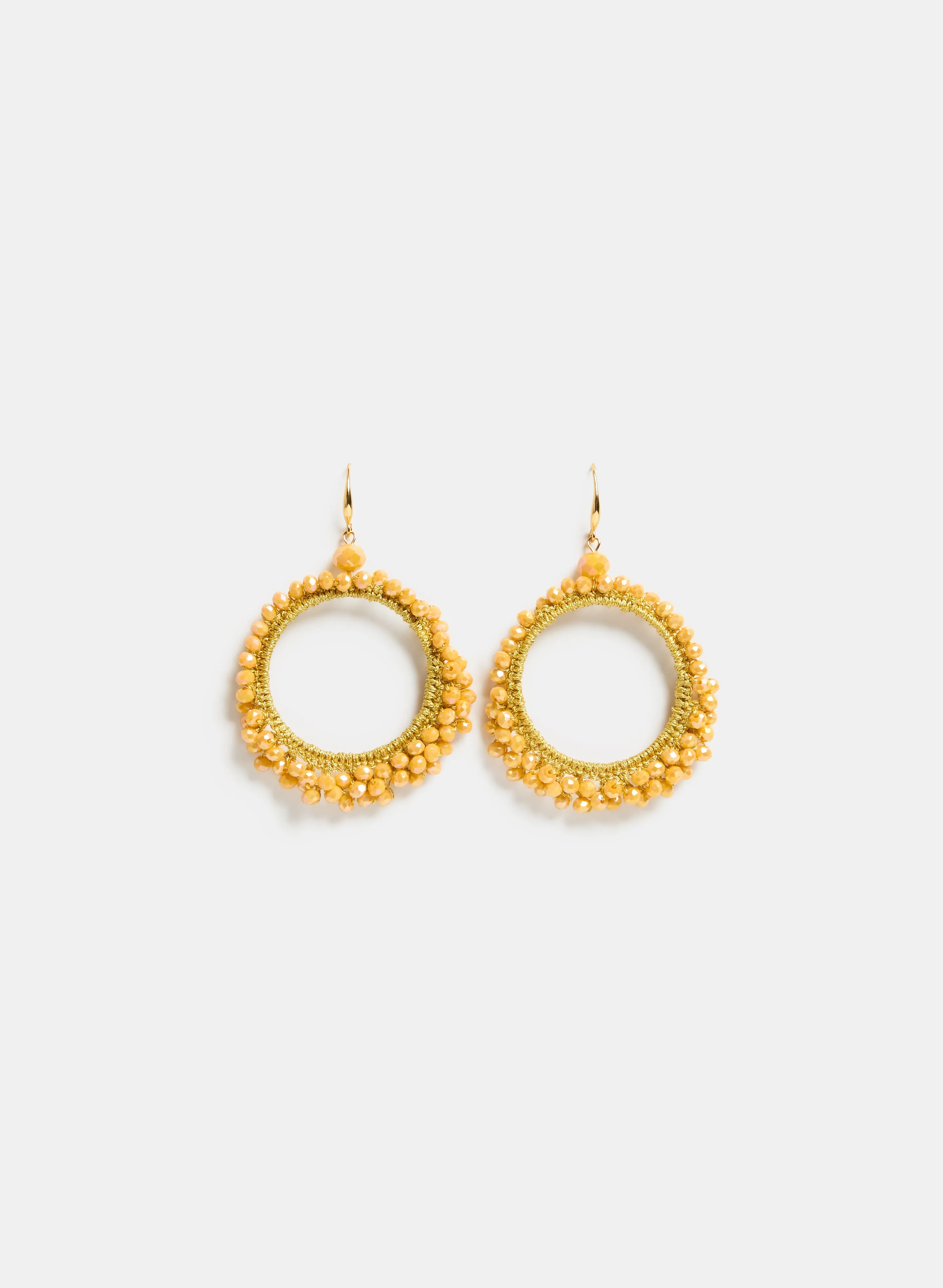 Circle Beaded Earrings sold by Melanie Lyne