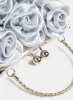 Rosette Evening Clutch sold by Melanie Lyne