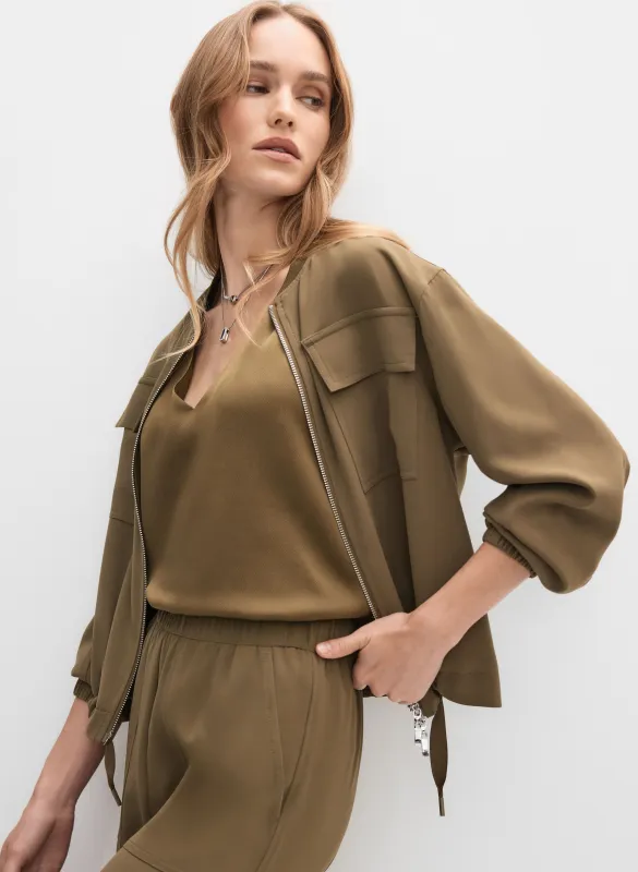 Short Zip-Up Jacket sold by Melanie Lyne