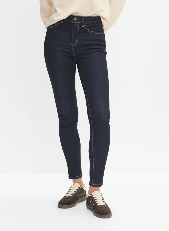 Slim-Leg Jeans sold by Melanie Lyne