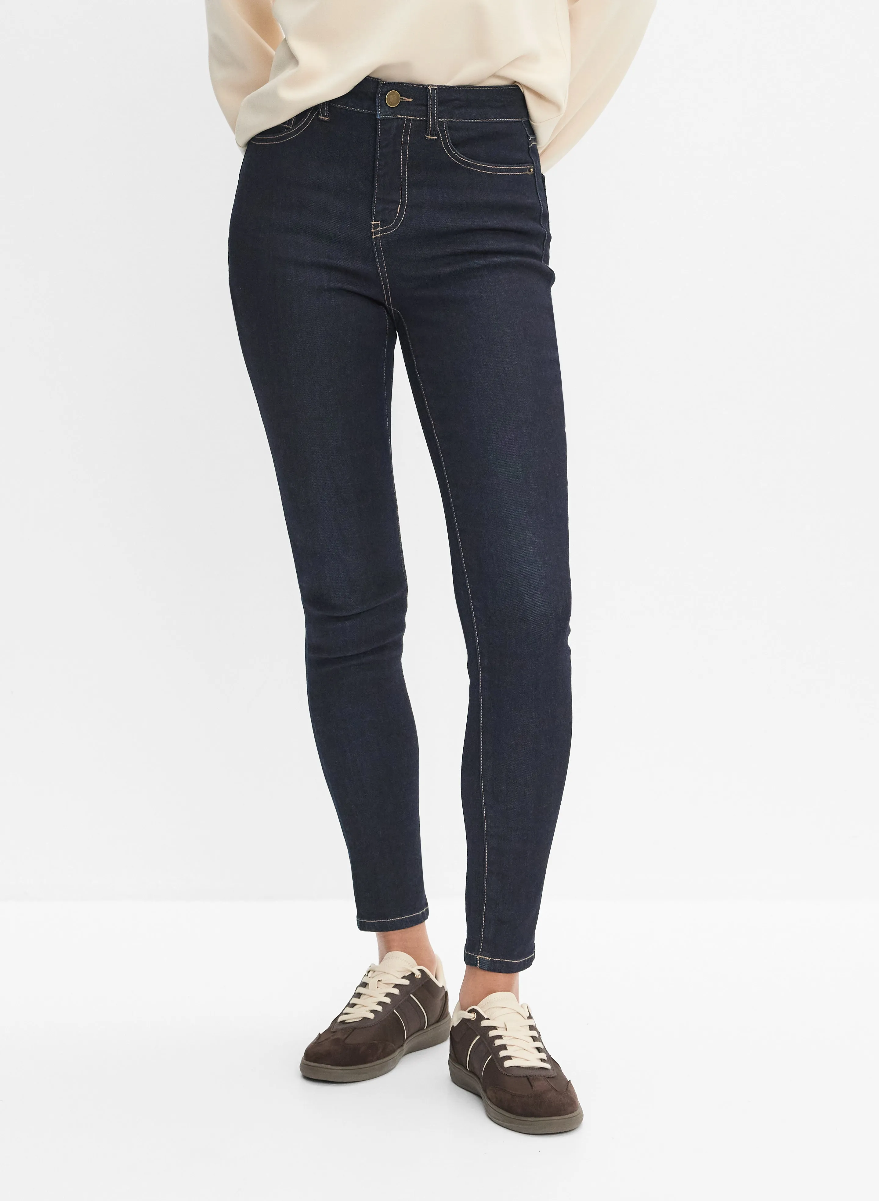Slim-Leg Jeans sold by Melanie Lyne