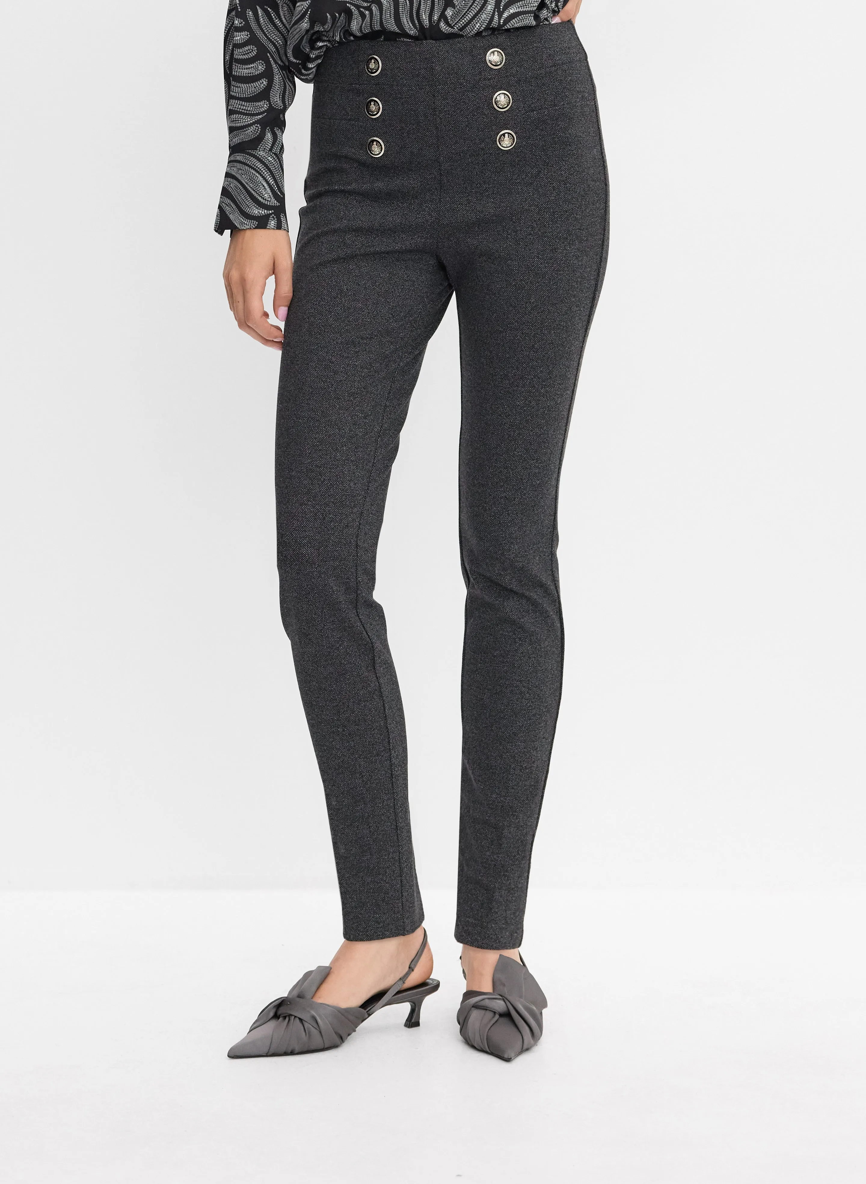 Embossed Button Slim-Leg Pants sold by Melanie Lyne