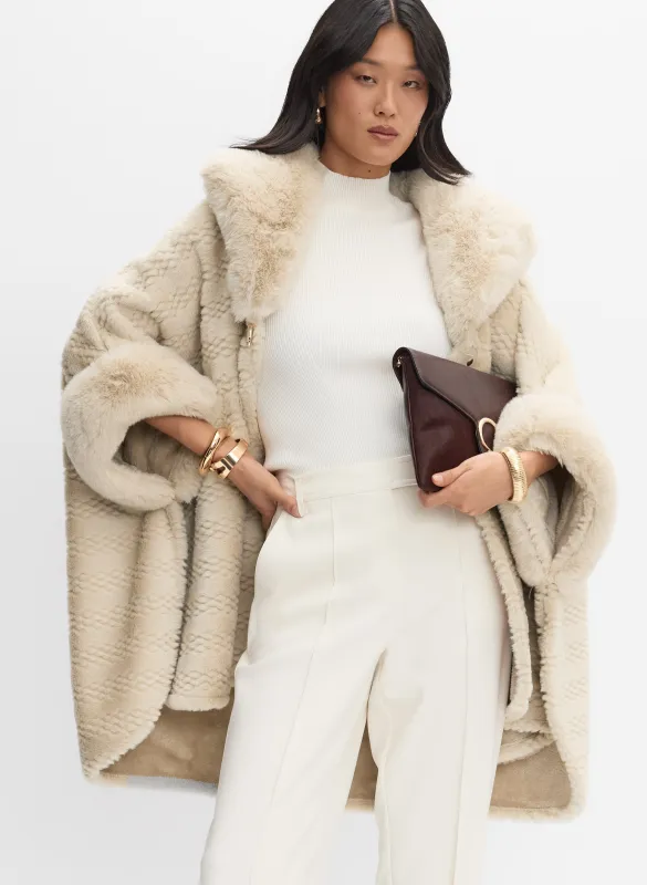Textured Faux-Fur Poncho sold by Melanie Lyne