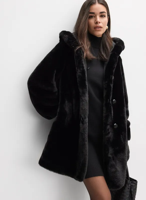 Reversible Faux Fur Coat sold by Melanie Lyne
