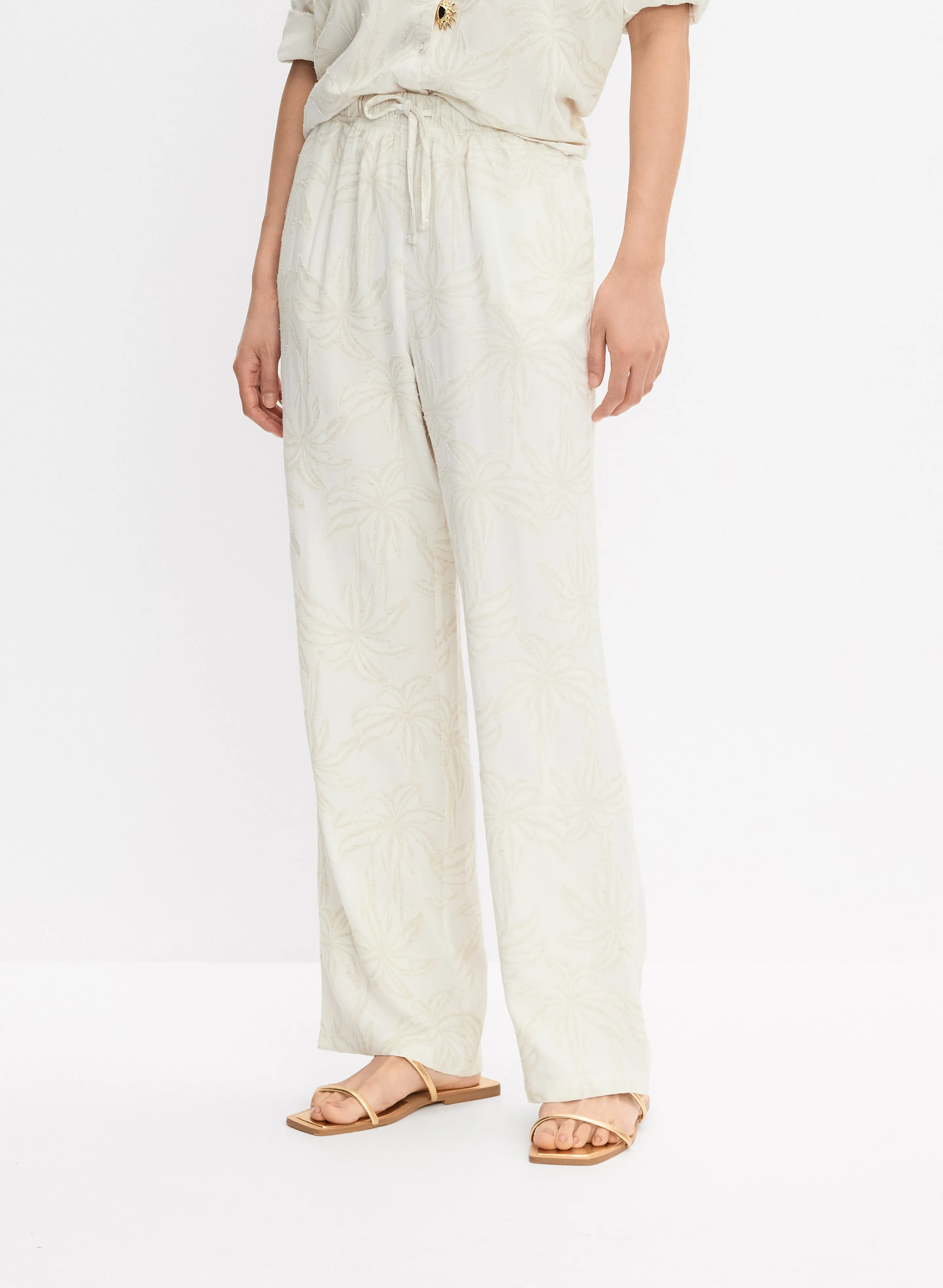Tonal Tropical Pants sold by Melanie Lyne