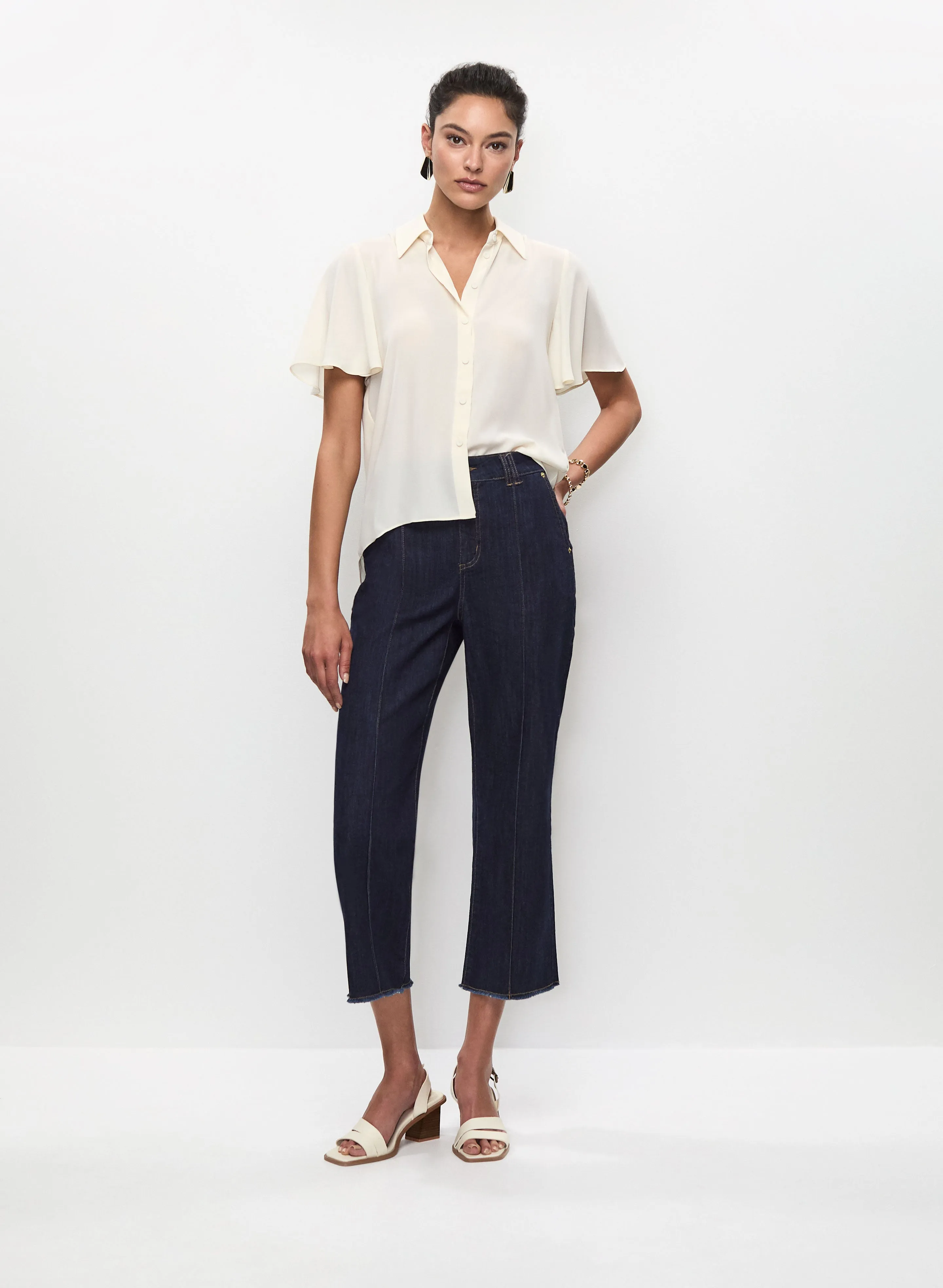 Crepe Blouse & Fringed Hem Flare Leg Jeans sold by Melanie Lyne