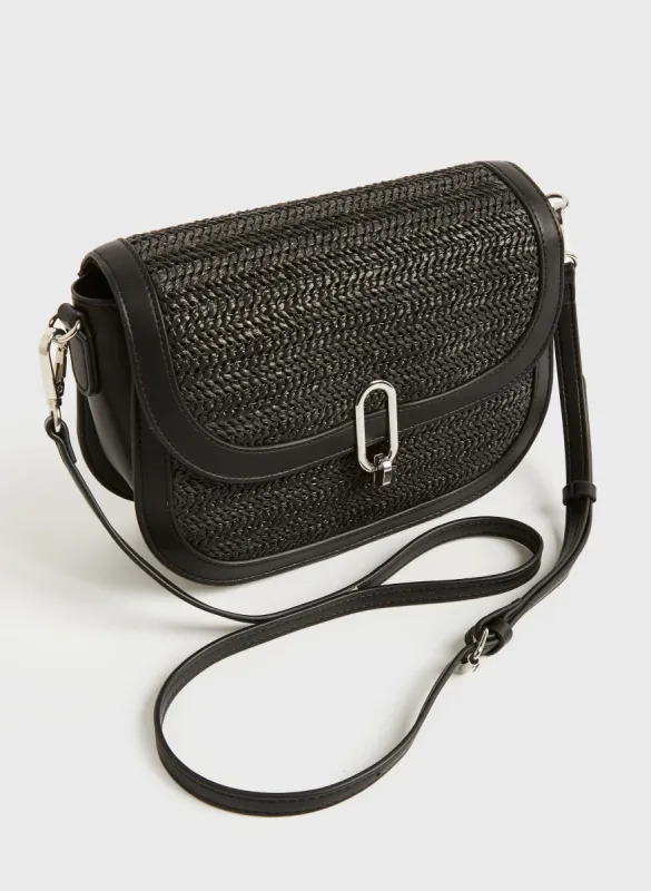 Straw Saddle Crossbody Bag sold by Melanie Lyne