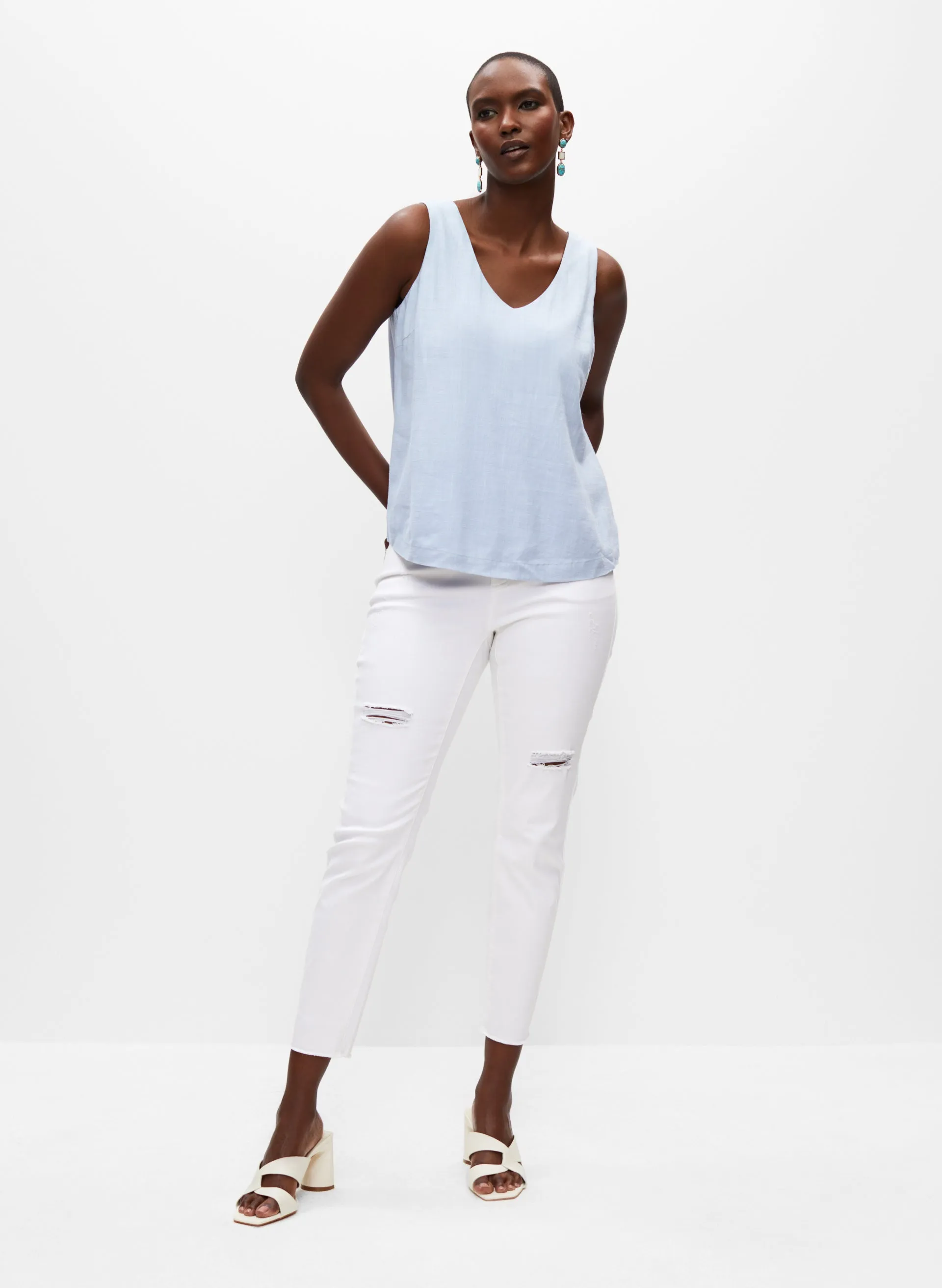 Sleeveless V-Neck Blouse sold by Melanie Lyne