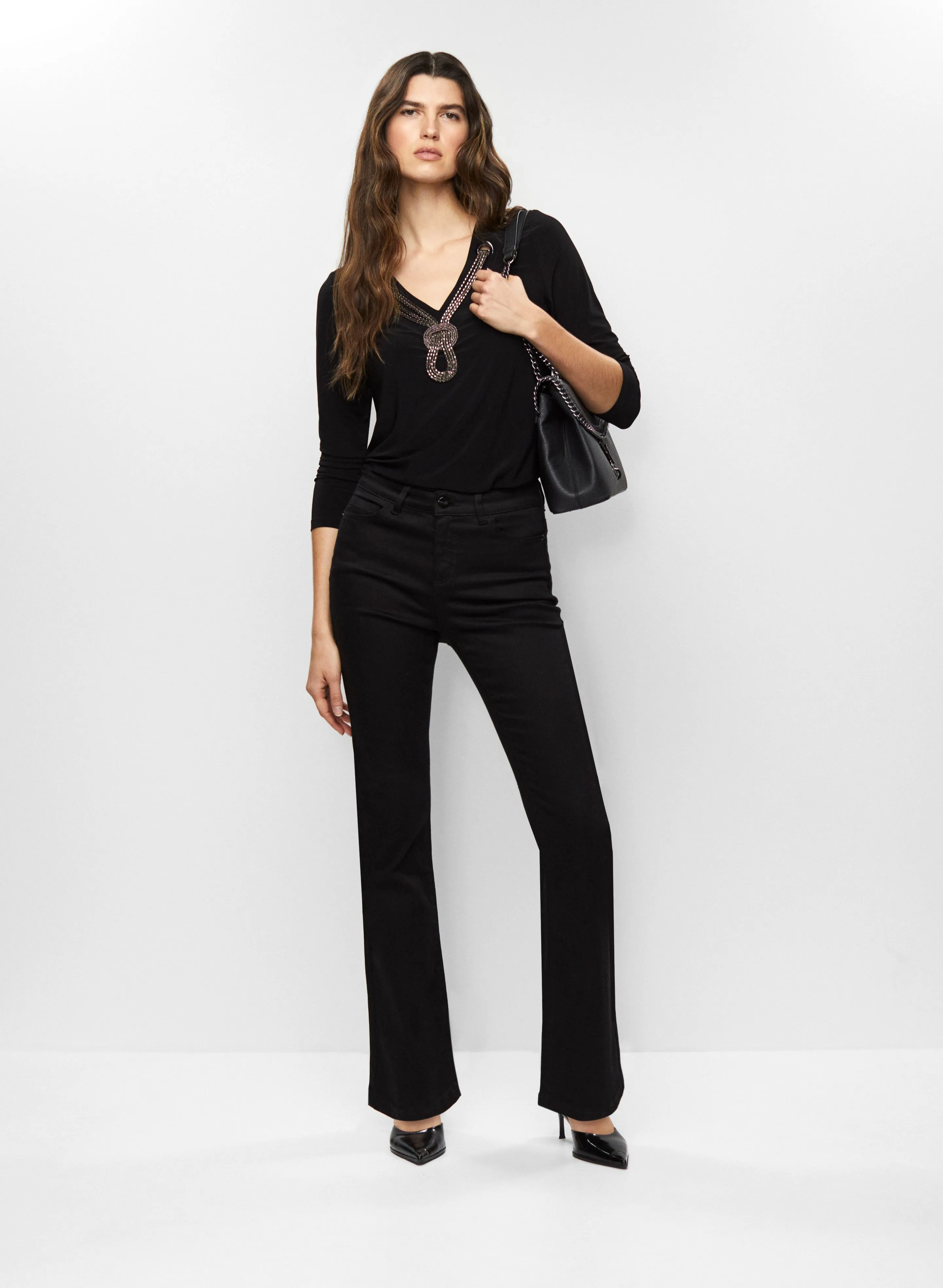 Chain Detail Tunic & Flare Leg Jeans sold by Melanie Lyne