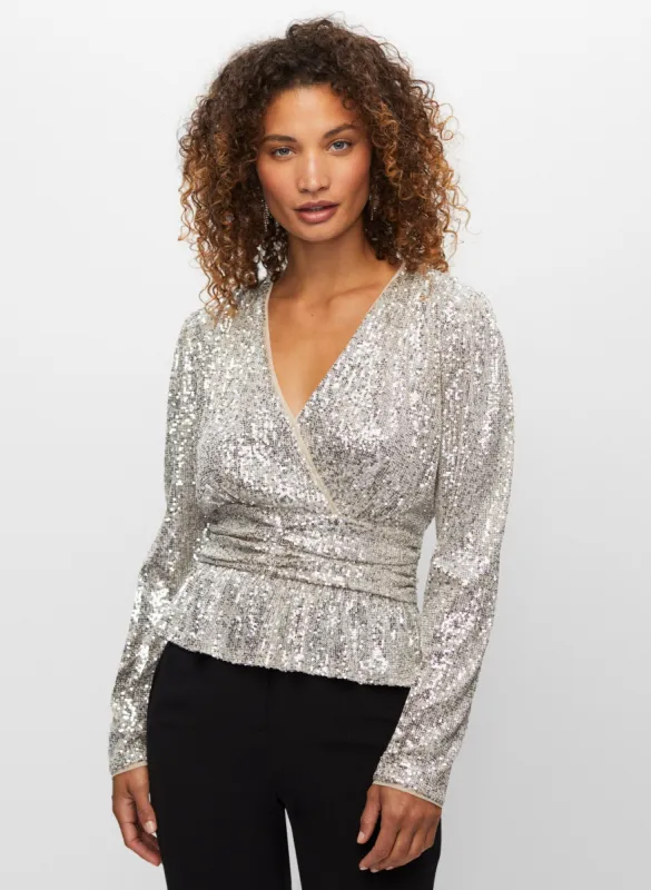 Sequin Peplum Top sold by Melanie Lyne