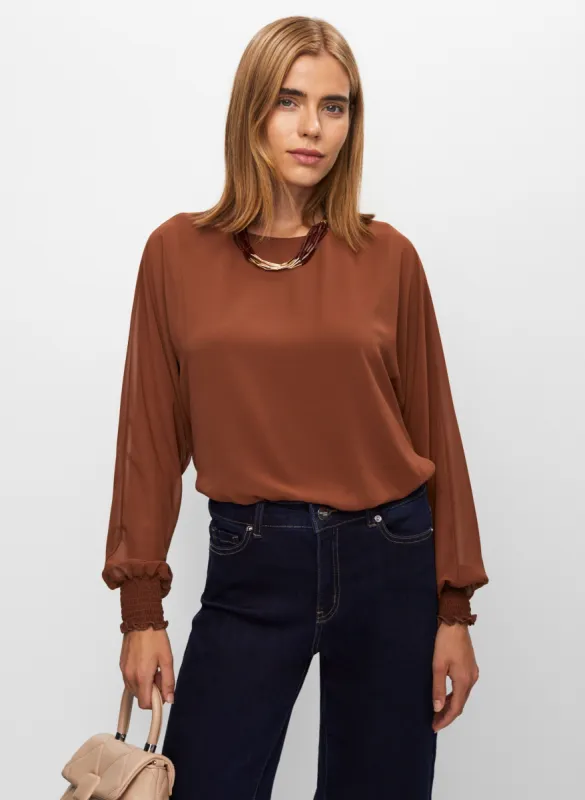 Smocked Detail Long Sleeve Top sold by Melanie Lyne