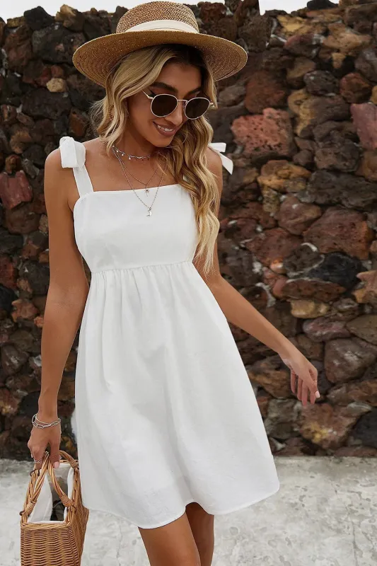 A Line White Spaghetti Straps Mini Graduation Dress sold by Wedtrend