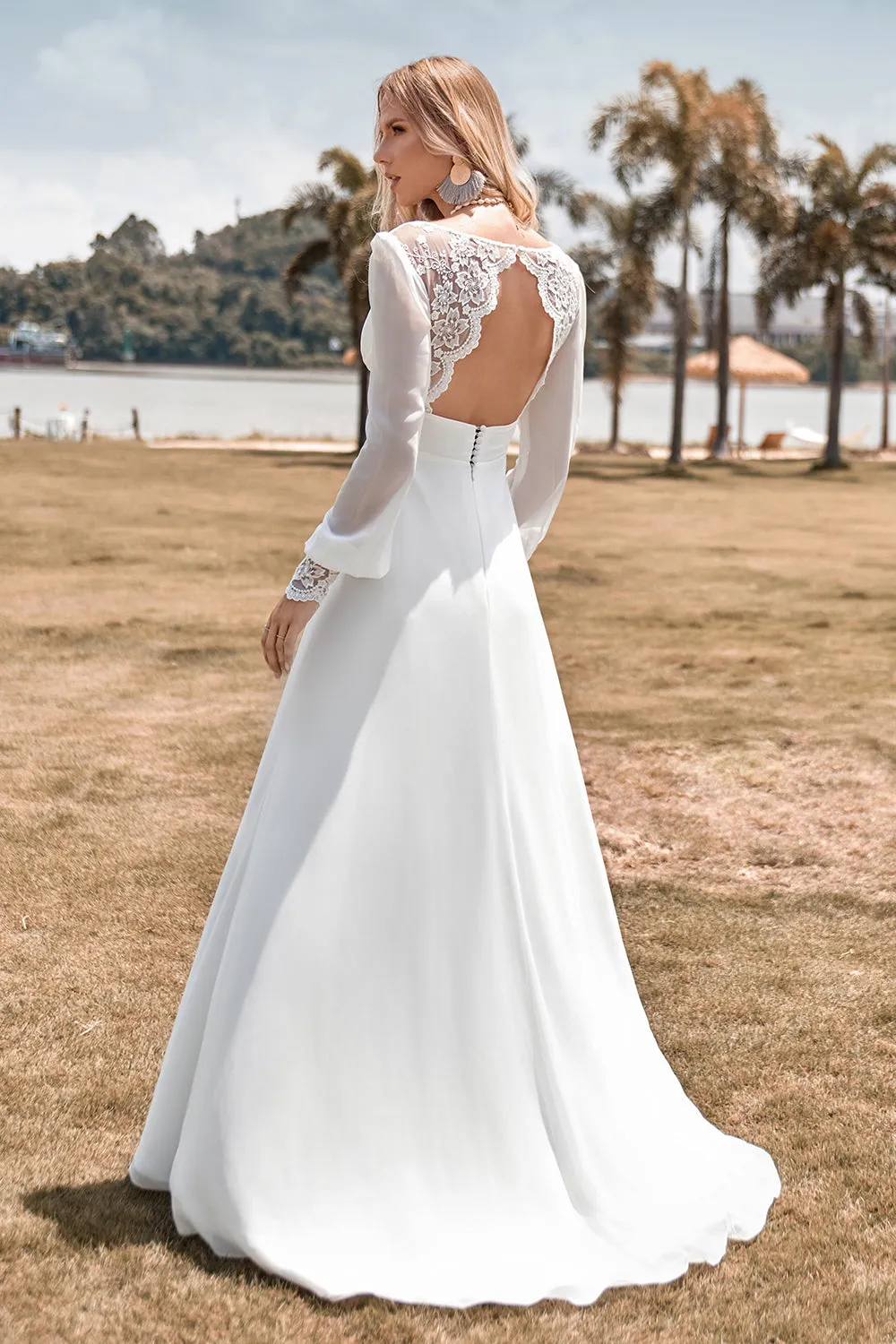 Ivory A Line V-Neck Floor Length Wedding Dress With Long Sleeves sold by Wedtrend
