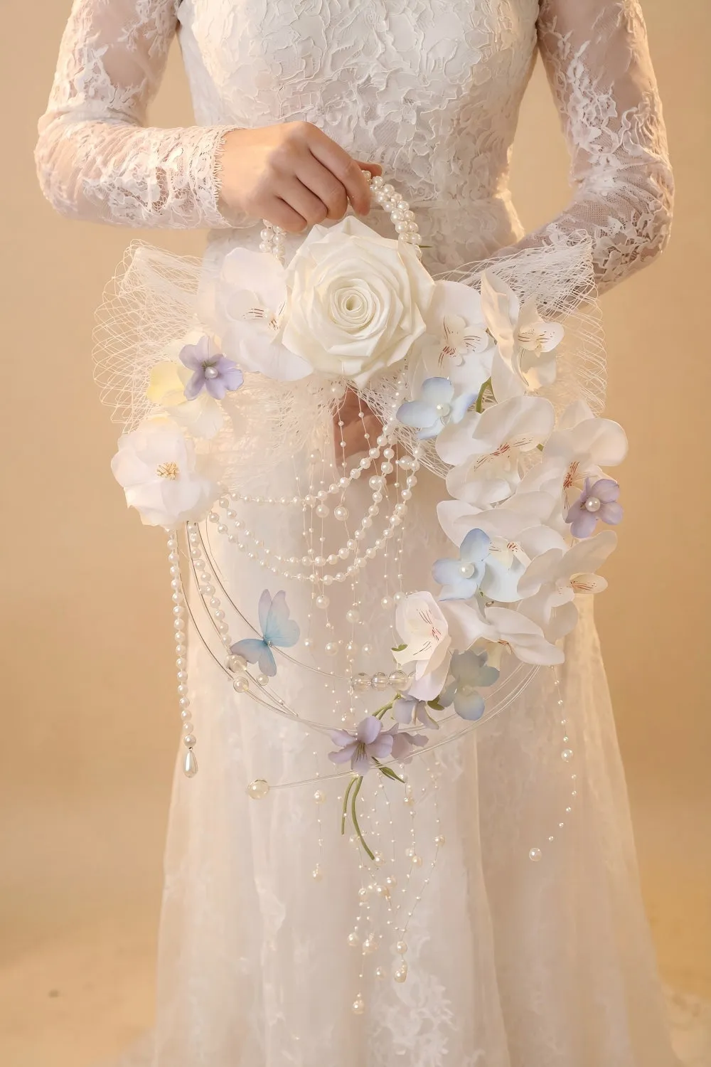Ivory Pearl Floral Wedding Bouquet with Butterfly Details sold by Wedtrend