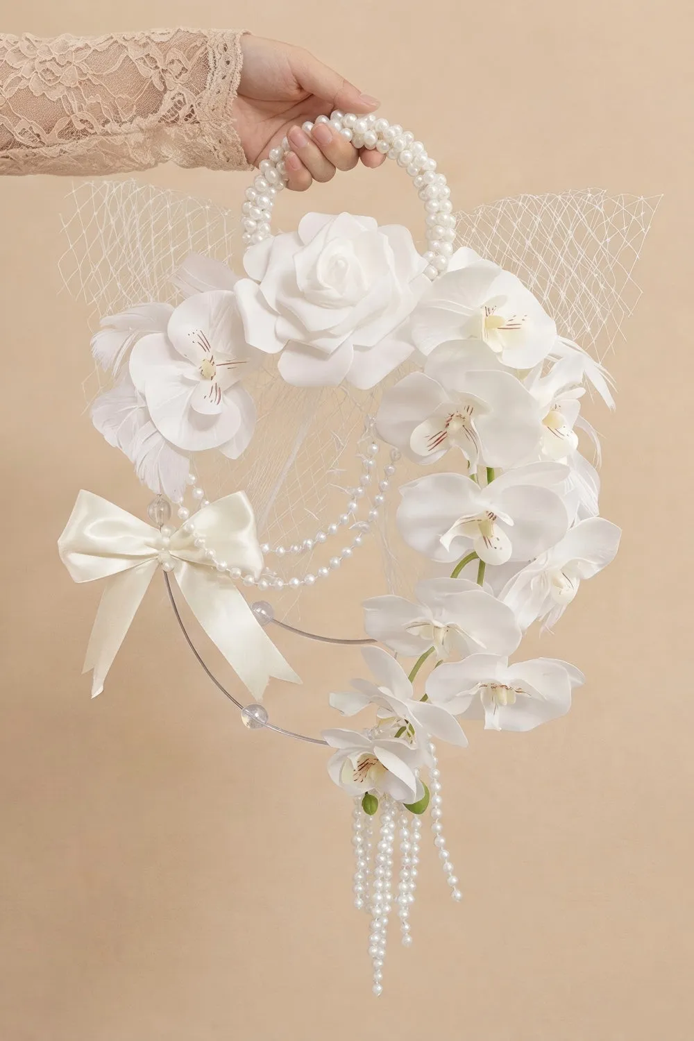 Pearl Hoop Bridal Bouquet with White Orchids sold by Wedtrend