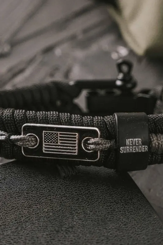Never Surrender Barbed Wire Paracord Bracelet sold by Nine Line