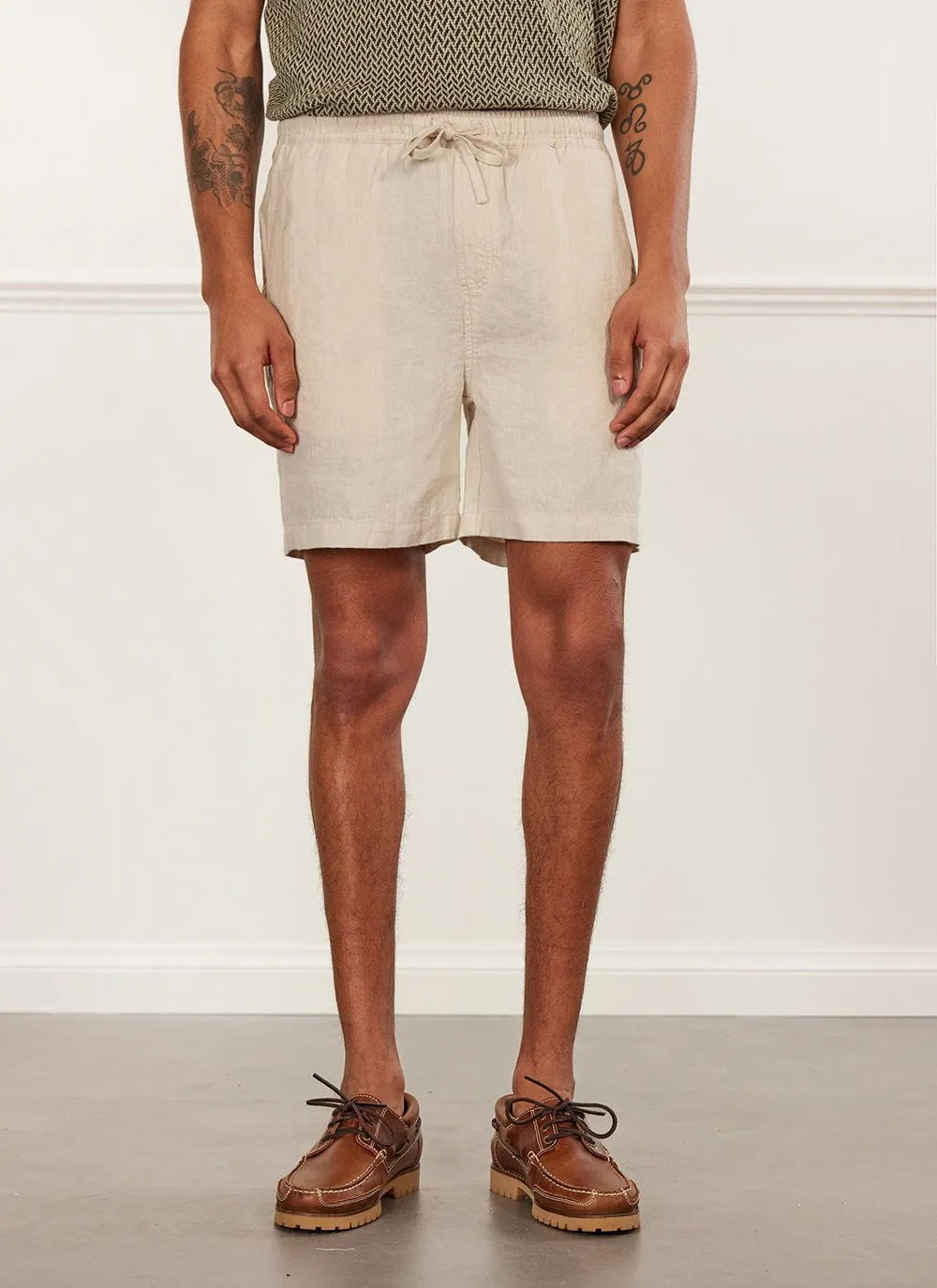 Pleated Linen Shorts | Cream sold by Percival
