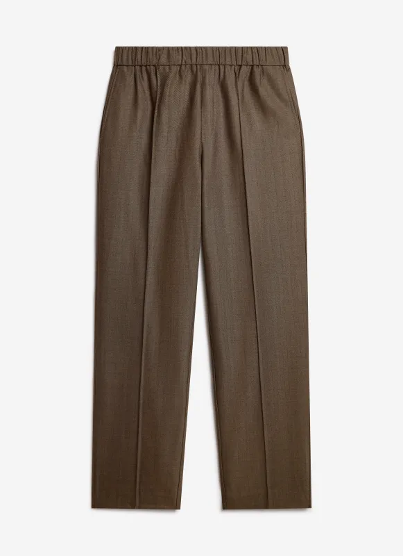 Grounds Relaxed Trousers | Herringbone Wool | Oak sold by Percival