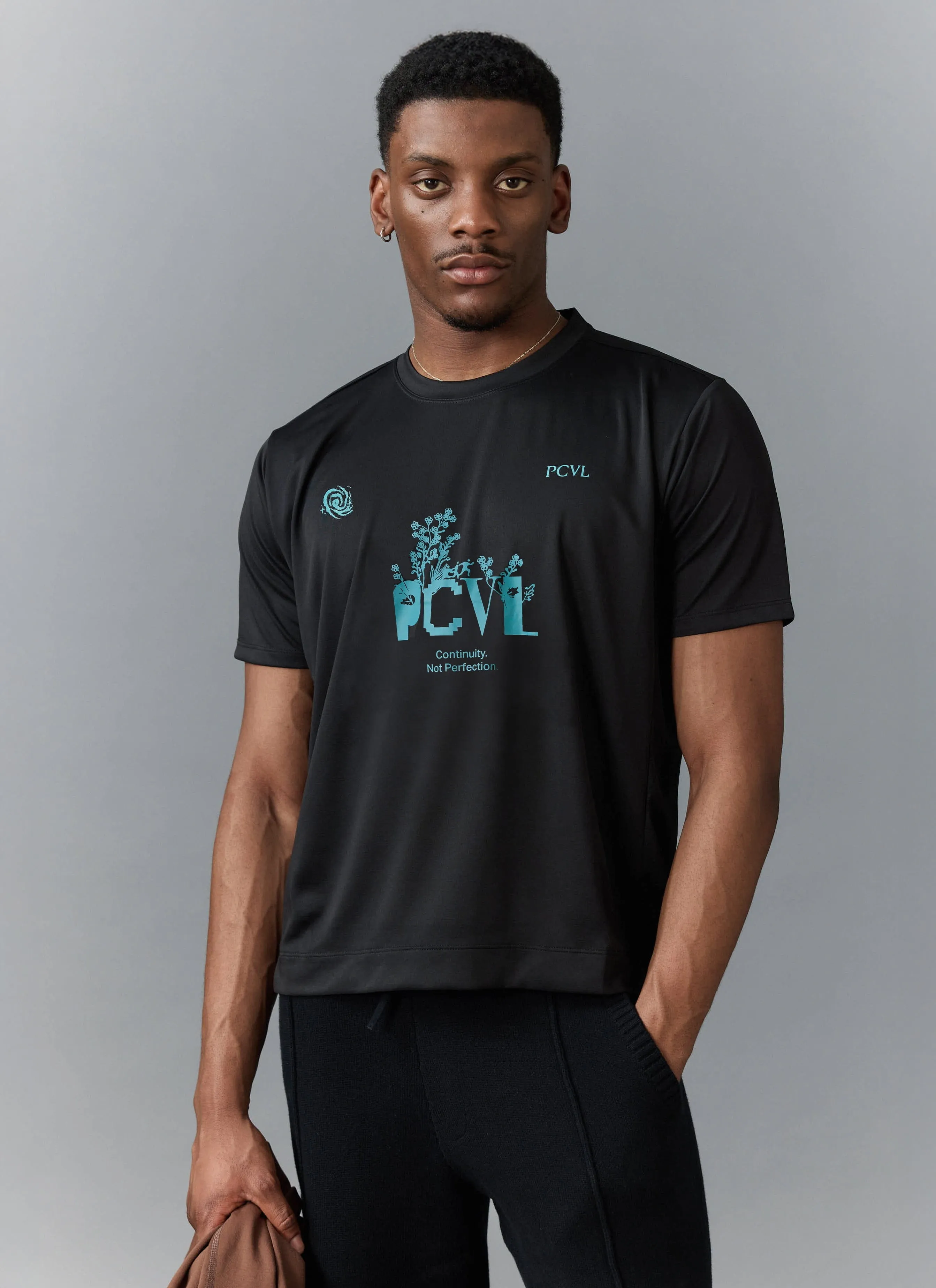 PCVL Graphic Printed Performance Top | Black sold by Percival