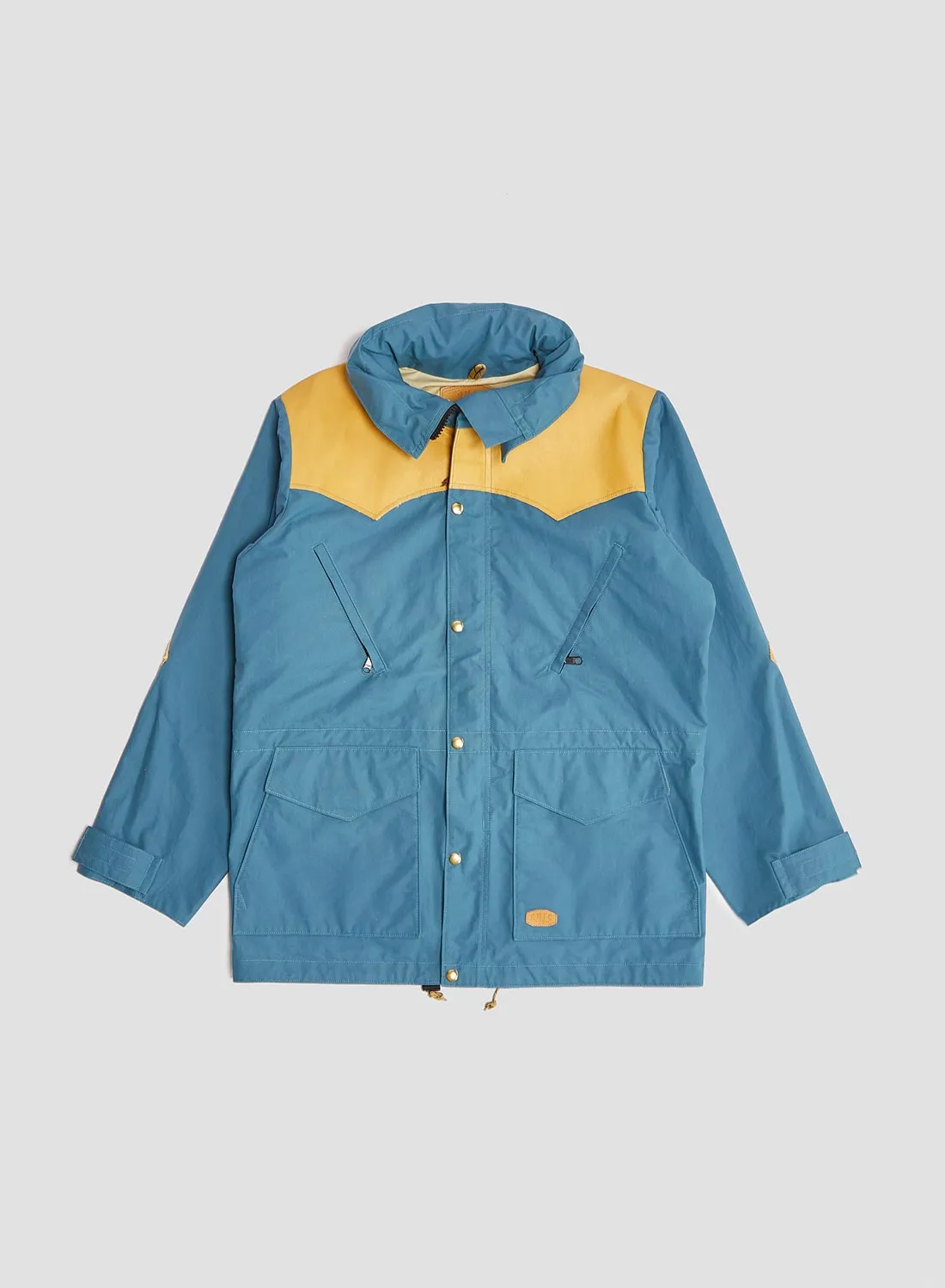 Rocky Mountain Featherbed x Nigel Cabourn Mountain Parka Dry Wax in Blue sold by Nigel Cabourn