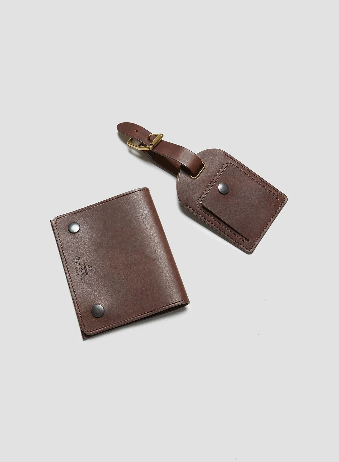 Passport Cover & Luggage Tag Leather Set in Dark Brown sold by Nigel Cabourn