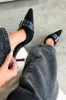 Odina Heels - Black sold by Thats So Fetch