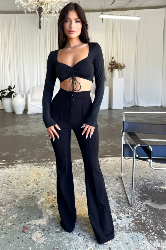 Token Flare Pants - Black sold by Thats So Fetch