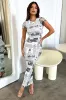Azira Maxi Dress - Newspaper Print sold by Thats So Fetch