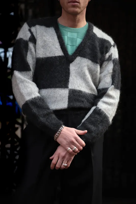 Black and white deep v-neck mohair sweater sold by Scott Fraser Collection