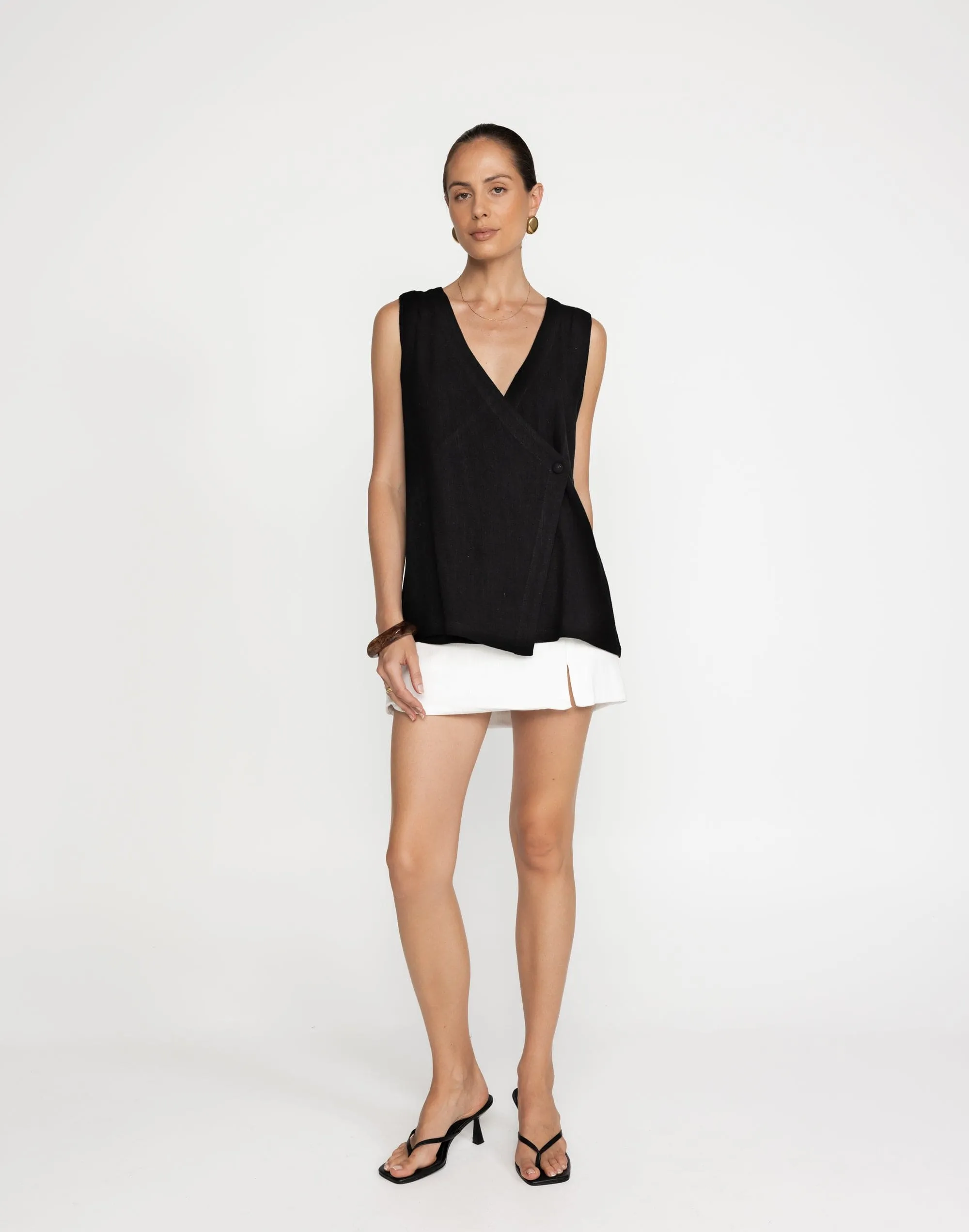 Sandra Mini Skirt (White) sold by Charcoal Clothing